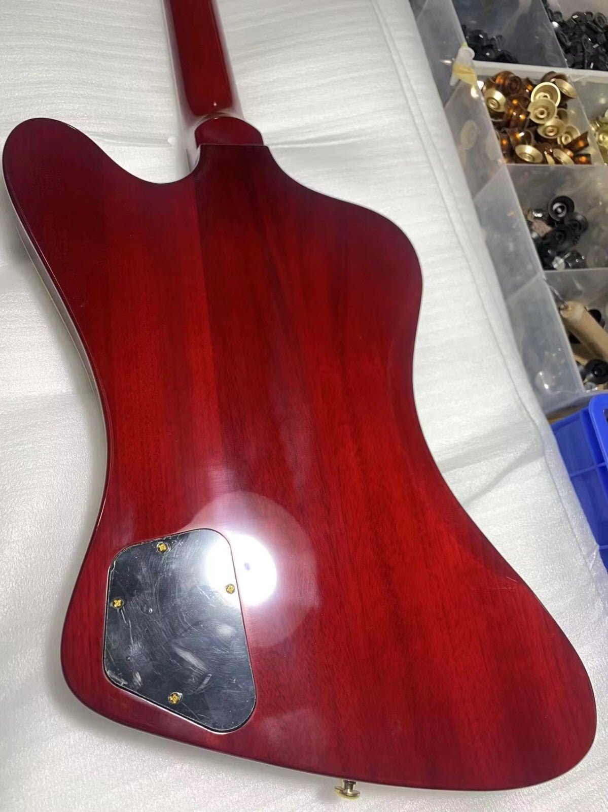 Red Gibson Firebird Style Guitar