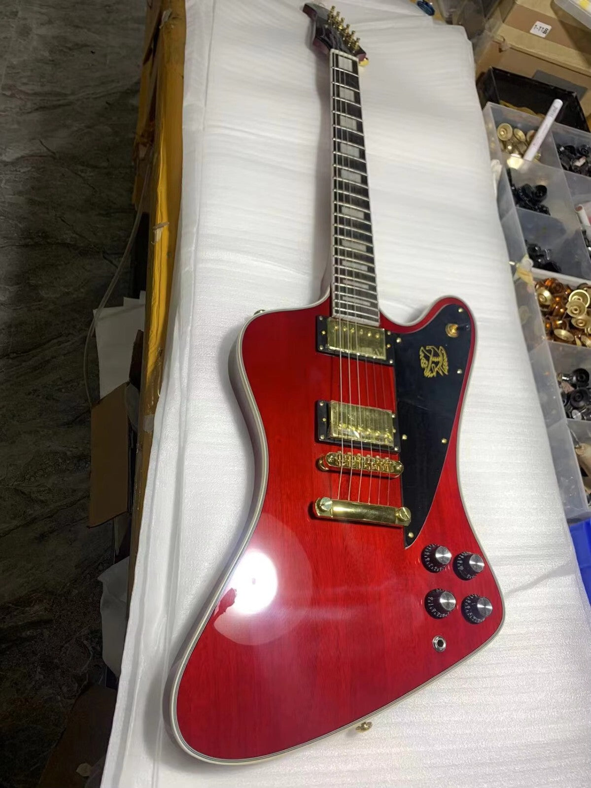 Red Gibson Firebird Style Guitar