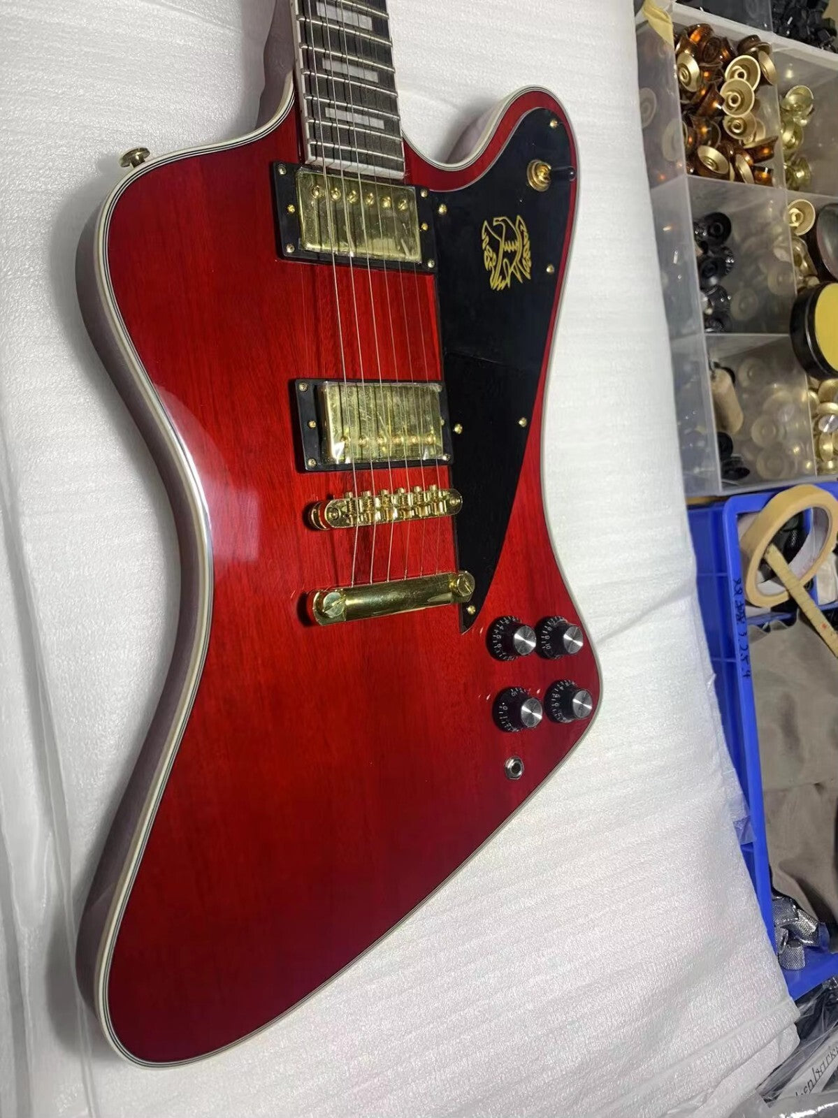 Red Gibson Firebird Style Guitar