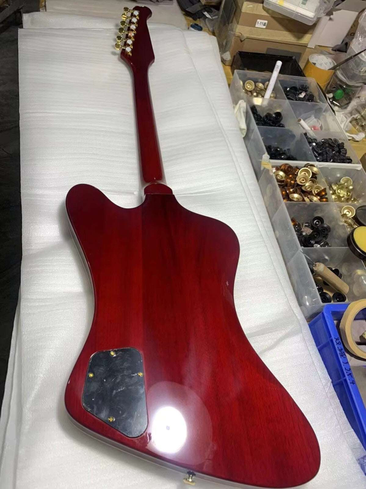 Red Gibson Firebird Style Guitar