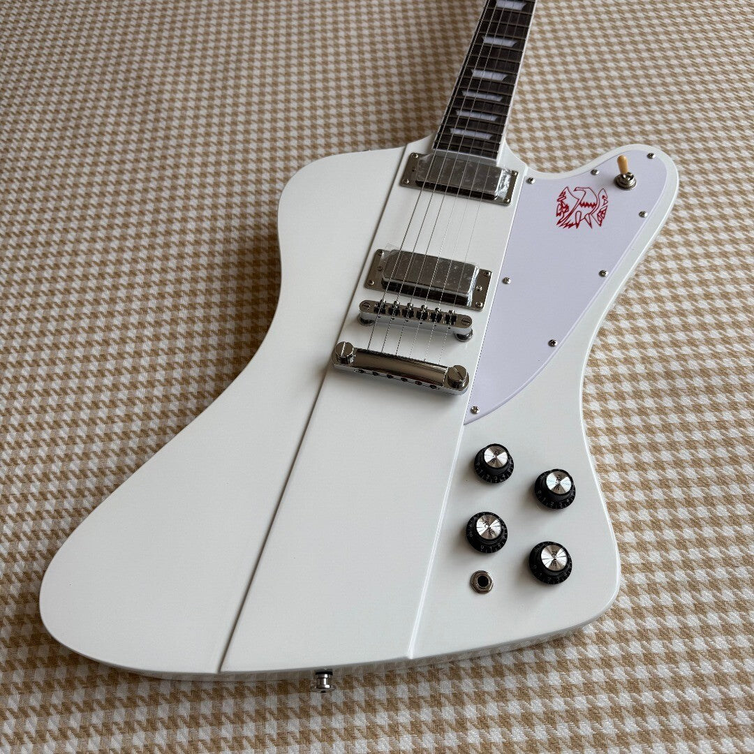 White Gibson Firebird Style Guitar