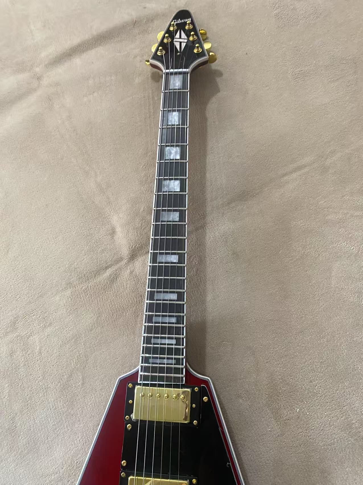 Red Gibson Flying V Style Guitar