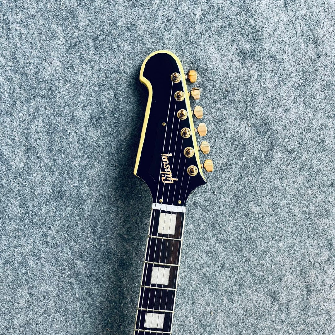 Yellow Firebird Style Guitar