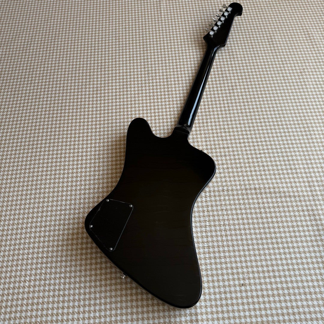 Black Gibson Firebird Style Guitar