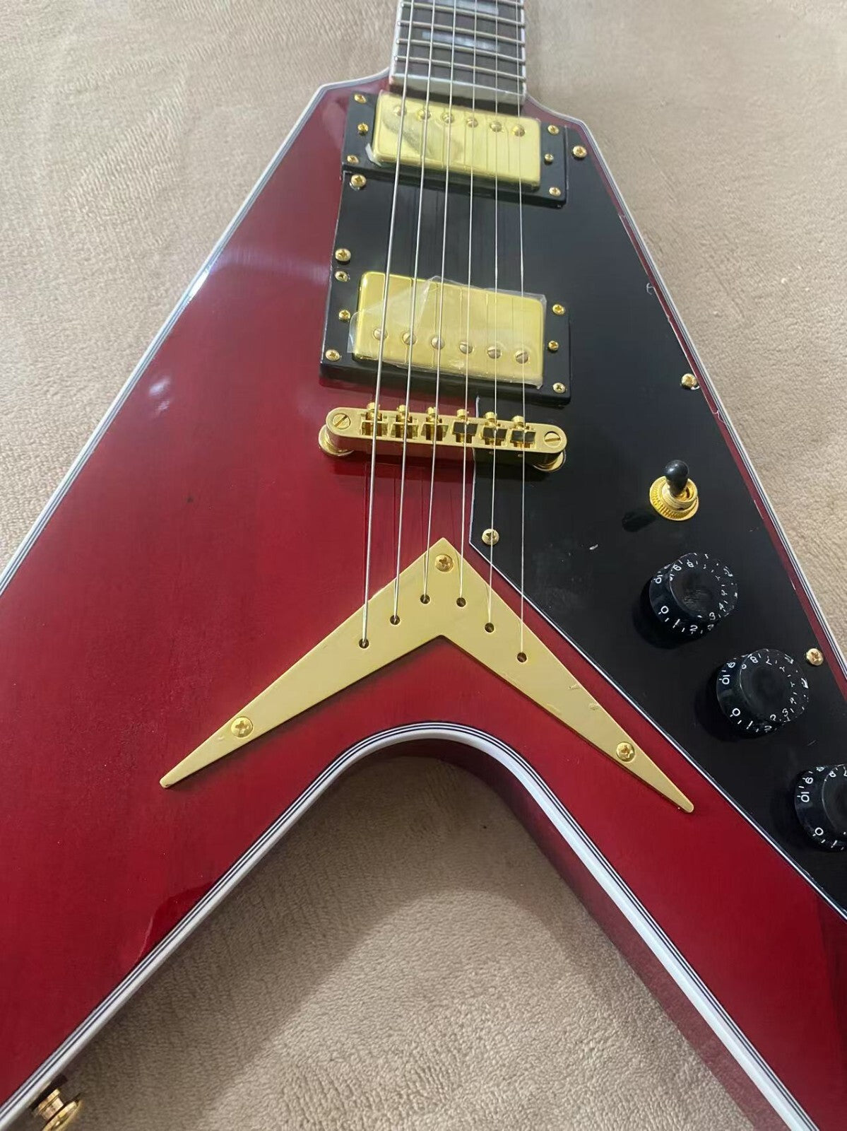 Red Gibson Flying V Style Guitar