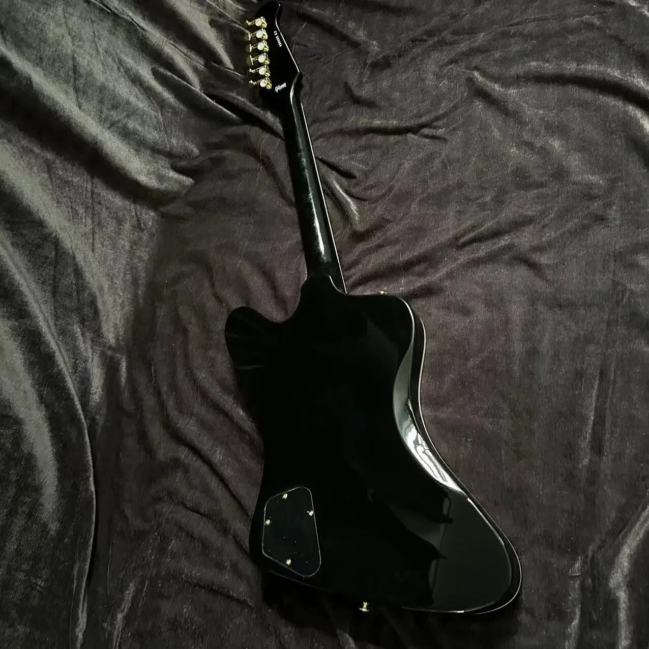 Black Gibson Firebird Style Guitar