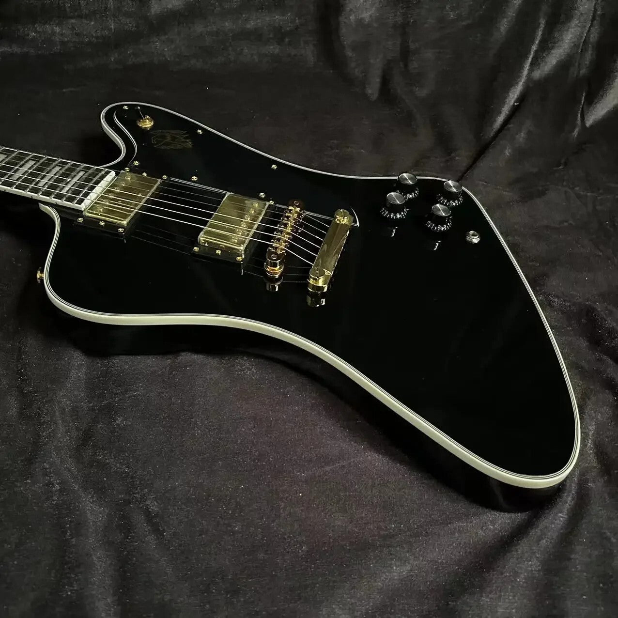 Black Gibson Firebird Style Guitar