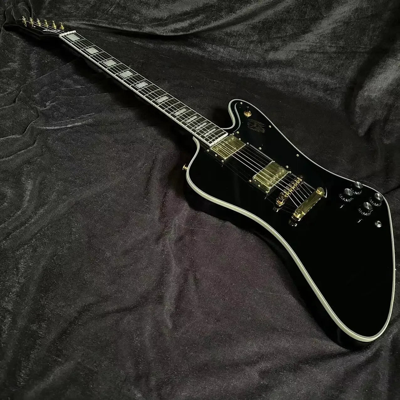 Black Gibson Firebird Style Guitar