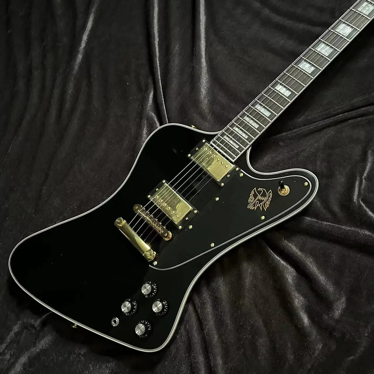 Black Gibson Firebird Style Guitar