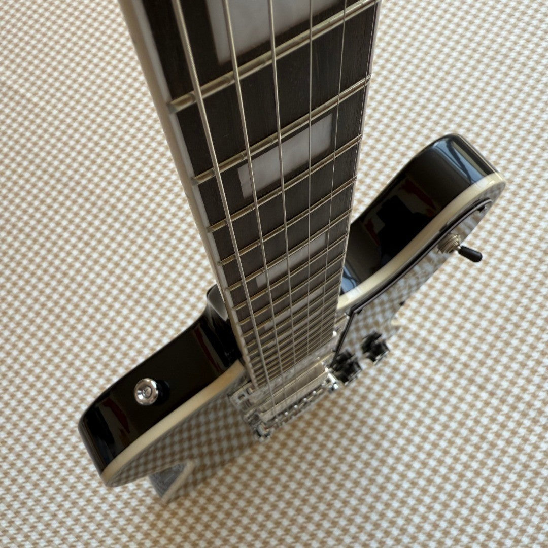 Black Gibson Firebird Style Guitar