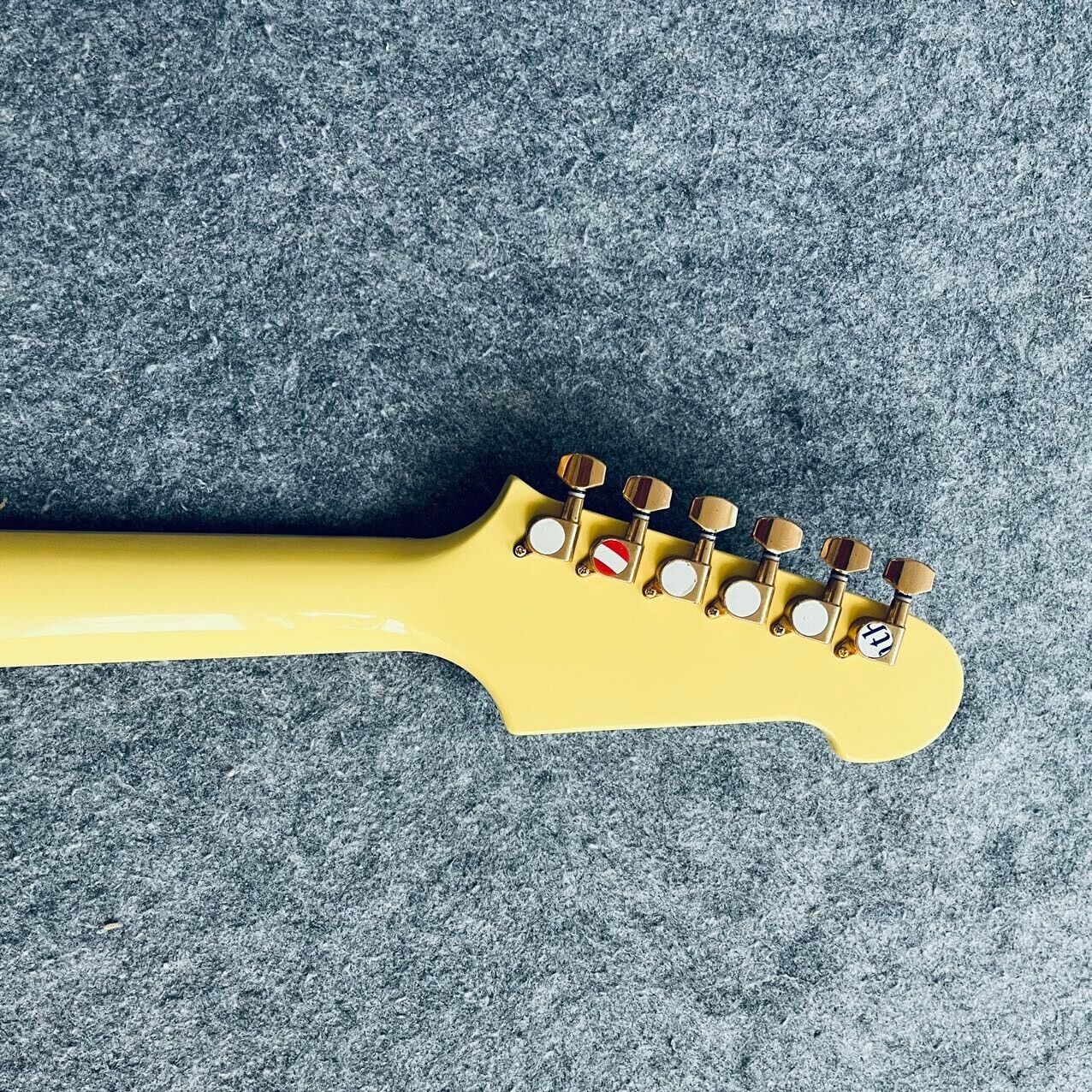Yellow Firebird Style Guitar