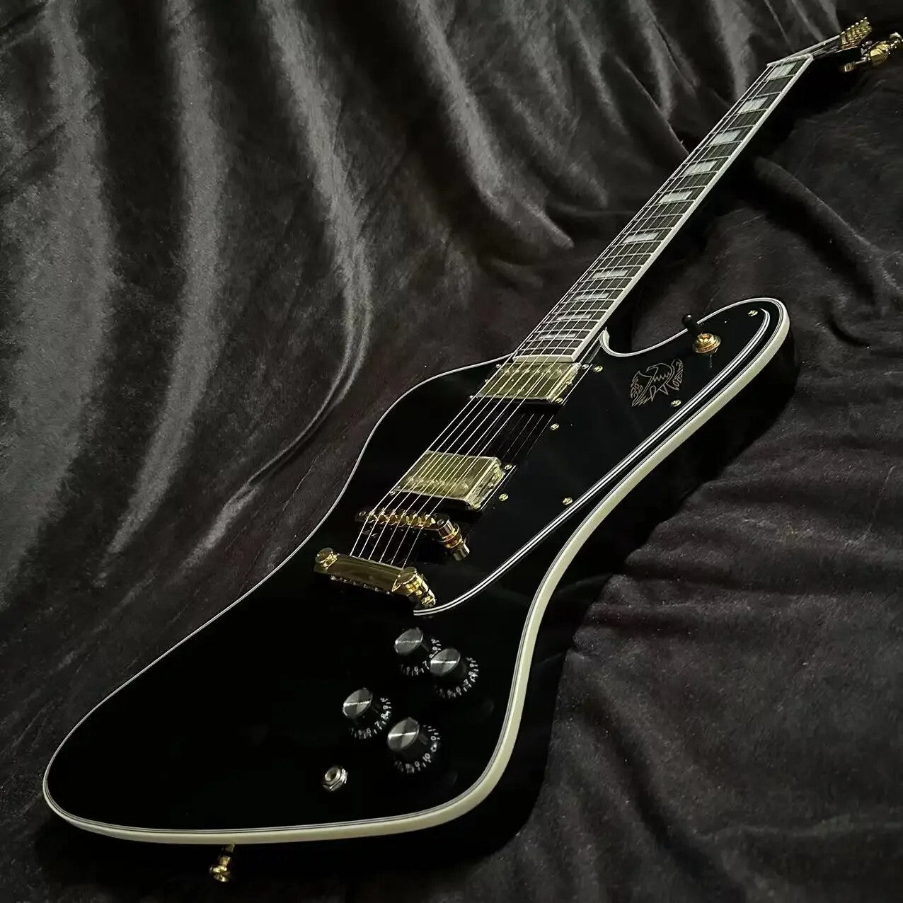 Black Gibson Firebird Style Guitar