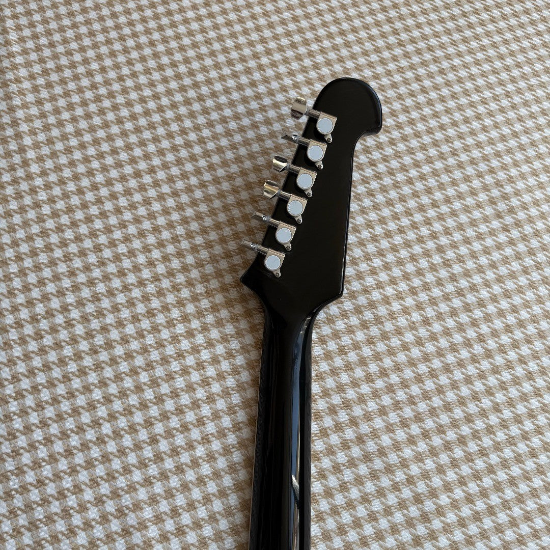 Black Gibson Firebird Style Guitar