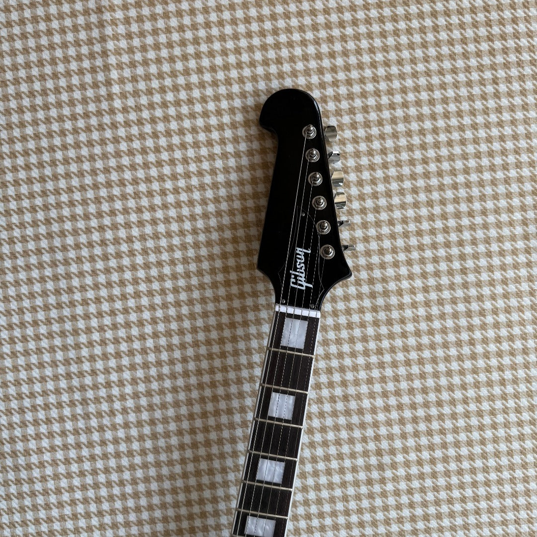 Black Gibson Firebird Style Guitar