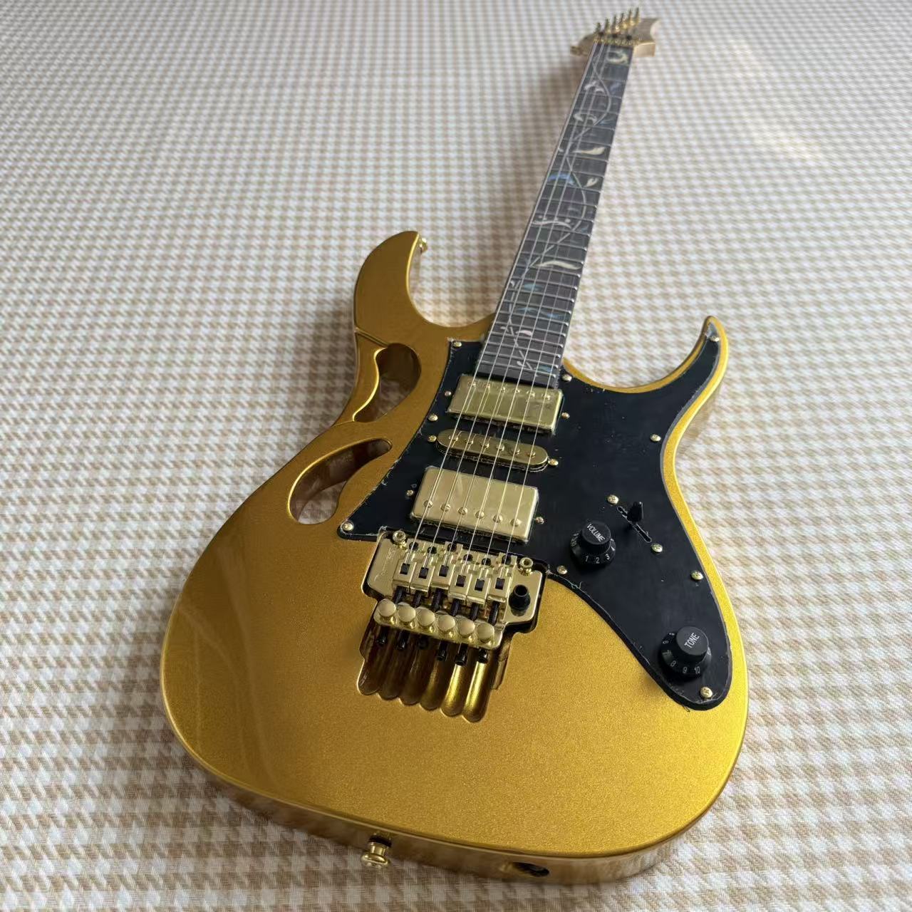 Gold Ibanez JEM Style Guitar
