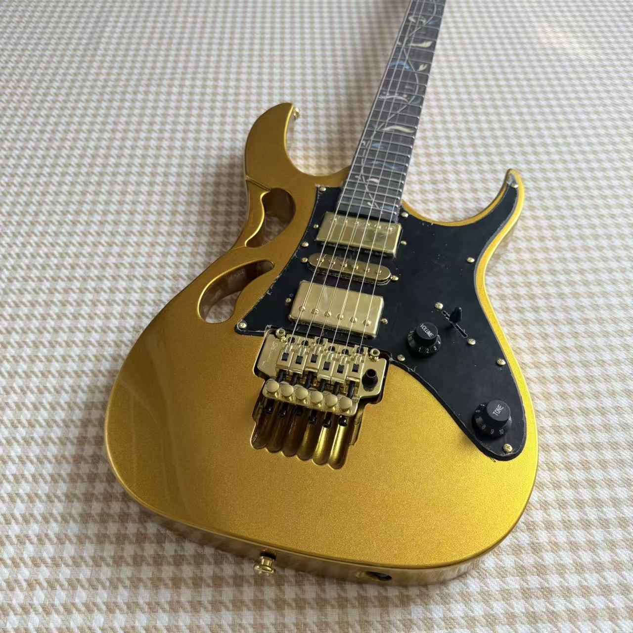 Gold Ibanez JEM Style Guitar