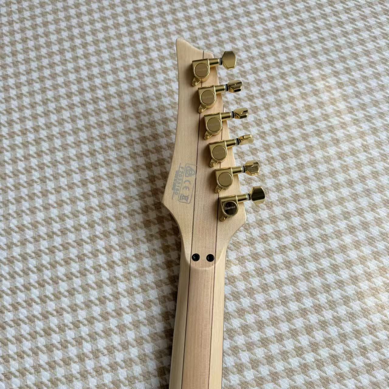 Gold Ibanez JEM Style Guitar