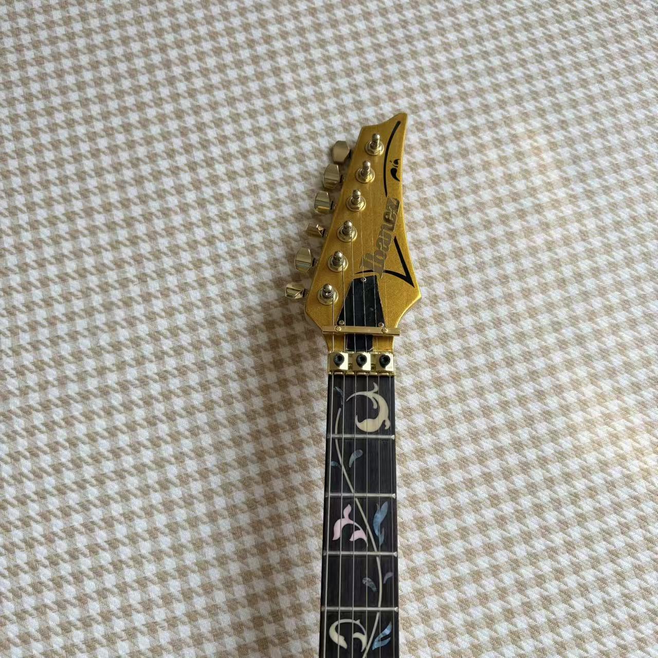 Gold Ibanez JEM Style Guitar