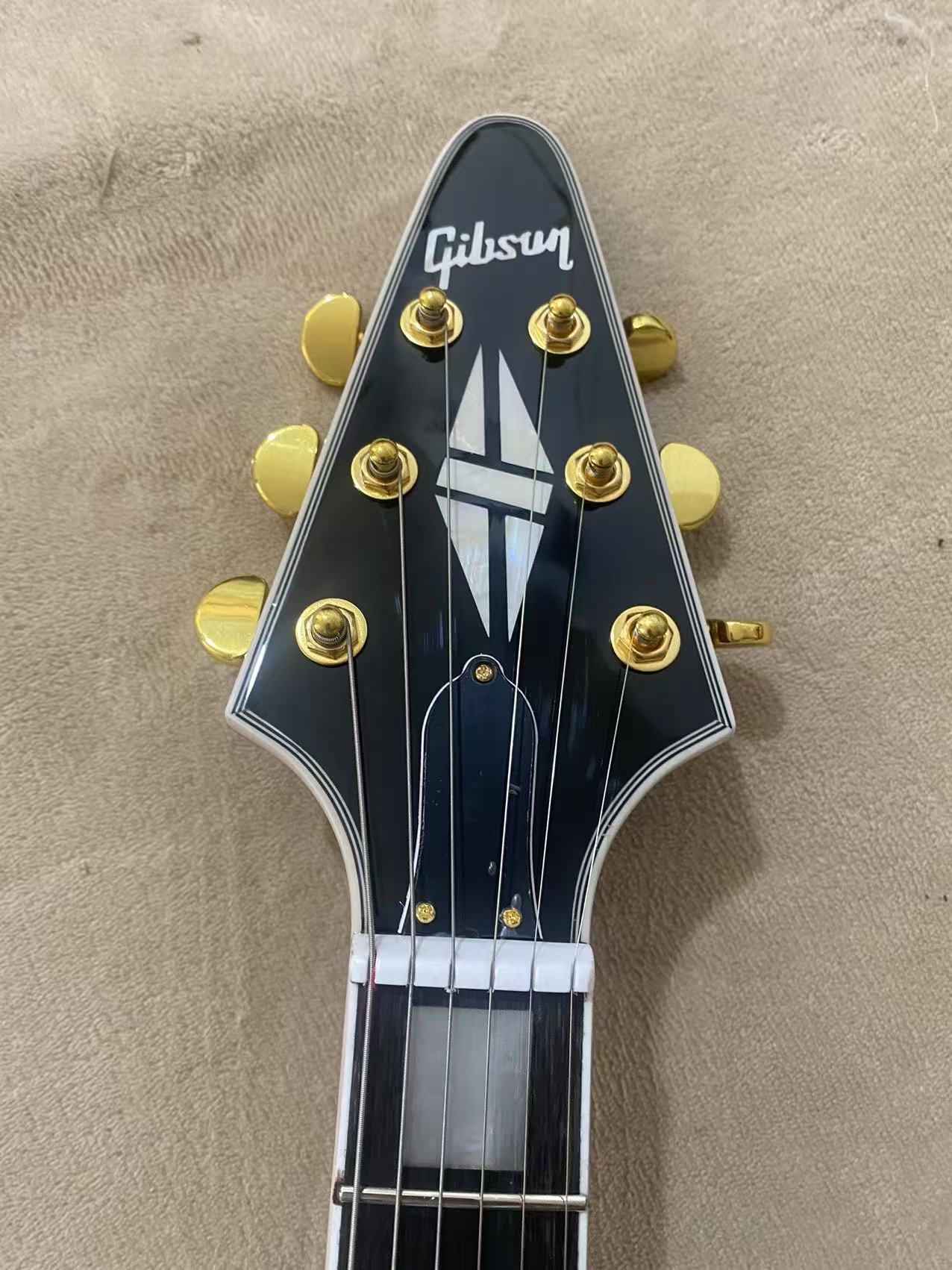 Red Gibson Flying V Style Guitar