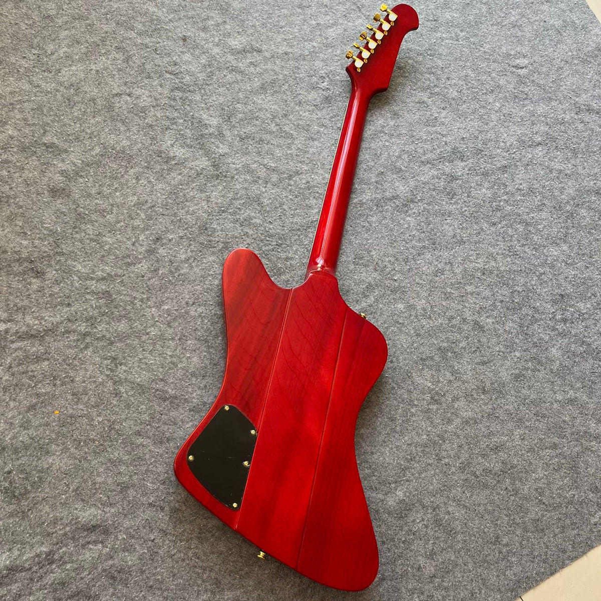 Red Gibson Firebird Style Guitar