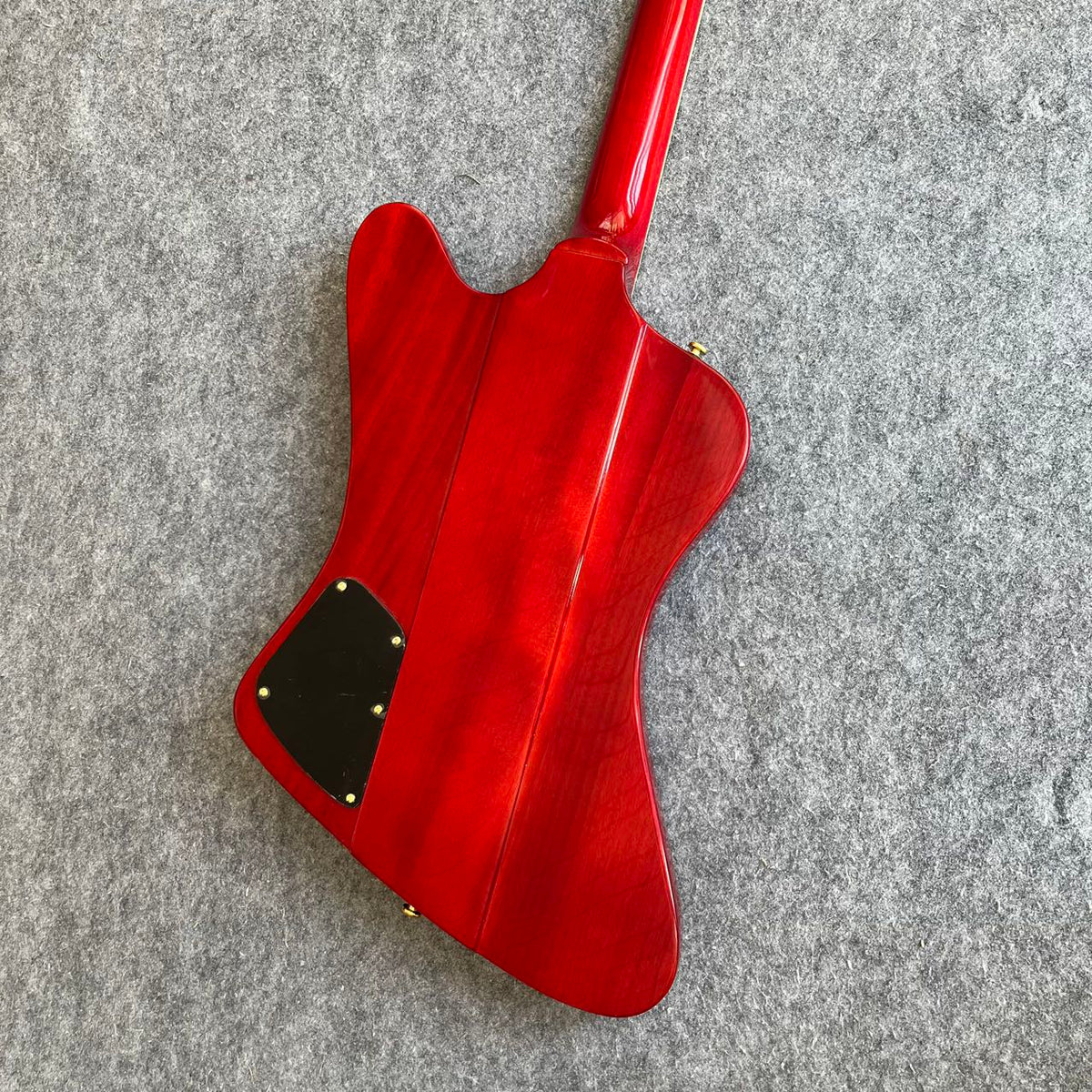 Red Gibson Firebird Style Guitar