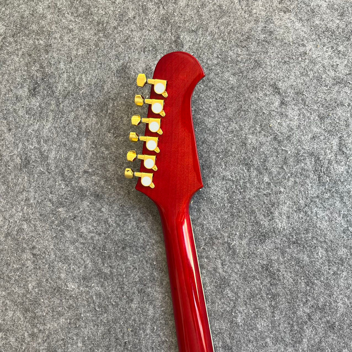 Red Gibson Firebird Style Guitar