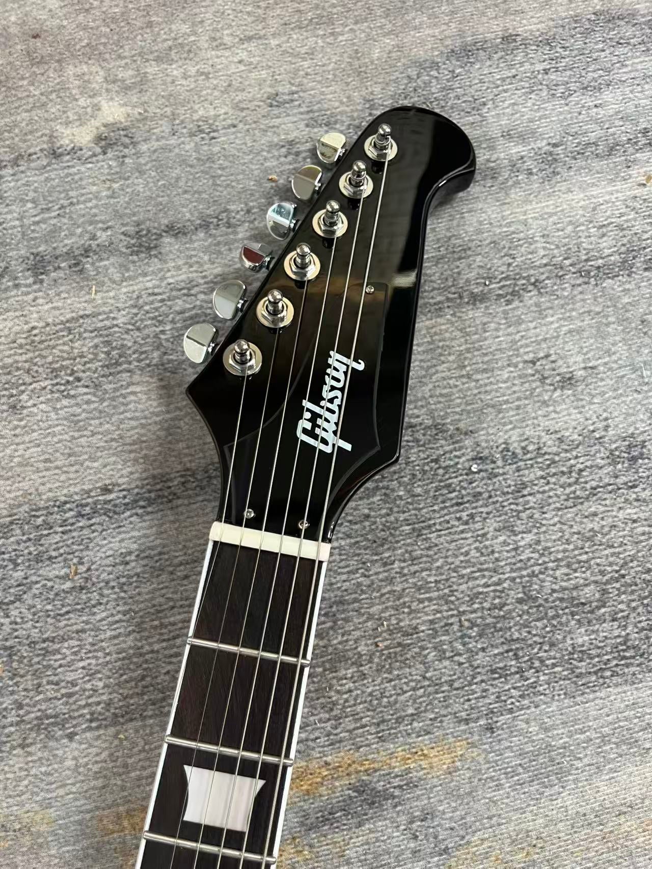 Sunburst Gibson Firebird Style Guitar