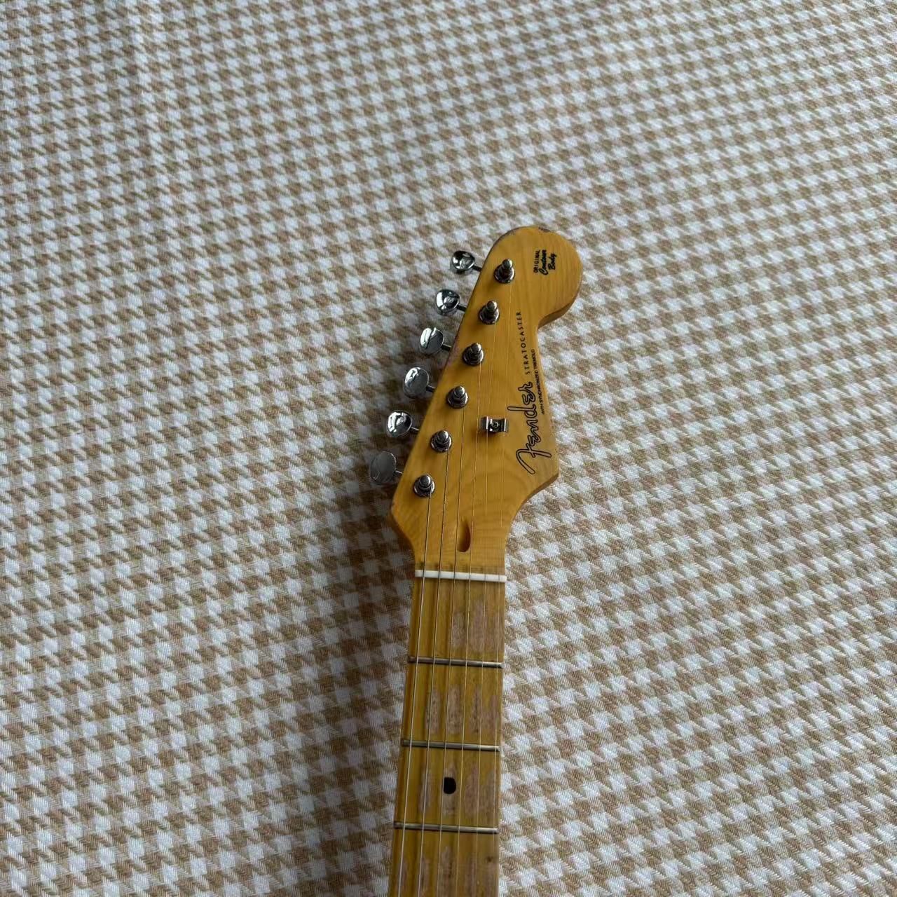 Worn Black Stratocaster Guitar