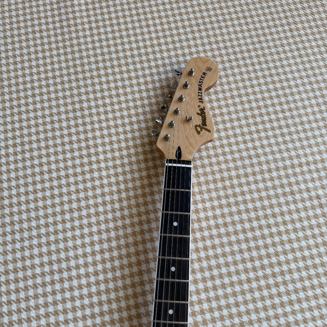 Pink Fender Jazzmaster Style Guitar